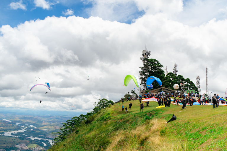 Paragliders over Pico da Ibituruna, Governador Valadares